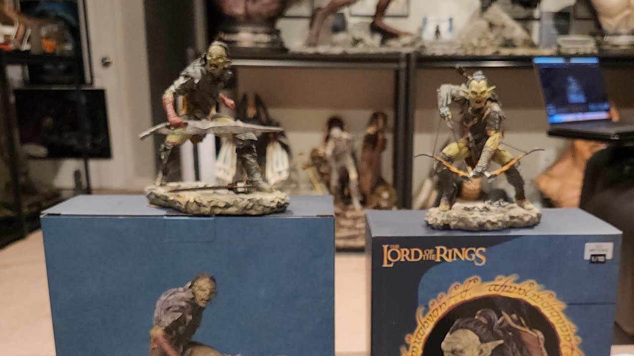 A visitor looks at original studies of 'Gollum' at the exhibition 