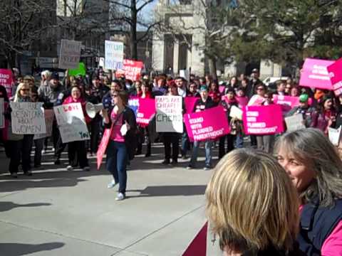 Planned Parenthood Rally at the Indiana Statehouse 3/8/11. Over 400 feminist Hoosiers confronted right-wing legislators, anti-woman activists, and biting cold weather to stop the Governor Daniels agenda.