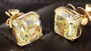 Exceptional Fancy Intense Yellow Cushion Cut Stud Earrings. Carat Weight: 13.13 + 13.13