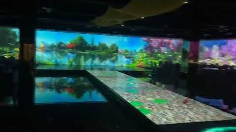 Immersive projection and interactive floor-groved