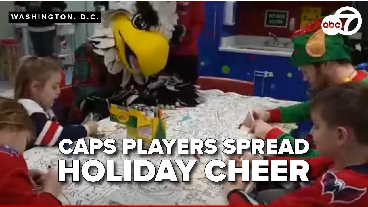 Caps players spread holiday cheer to young patients - YouTube