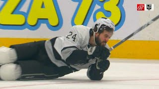 Phillip Danault shaken up by a hit from Zach Hyman and goes down the tunnel.