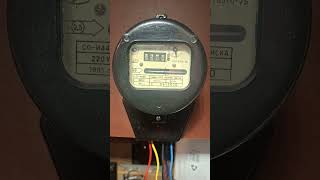 Russian kWh meter loaded at 9.5 Amps. the small dial does 3 full turns for 0.1 kWh.