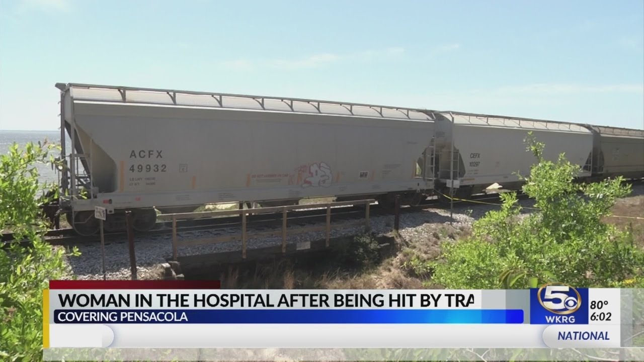 Woman in critical condition after being struck by train - YouTube