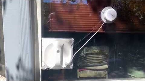 The Ecovacs Winbot X window cleaning robot in action