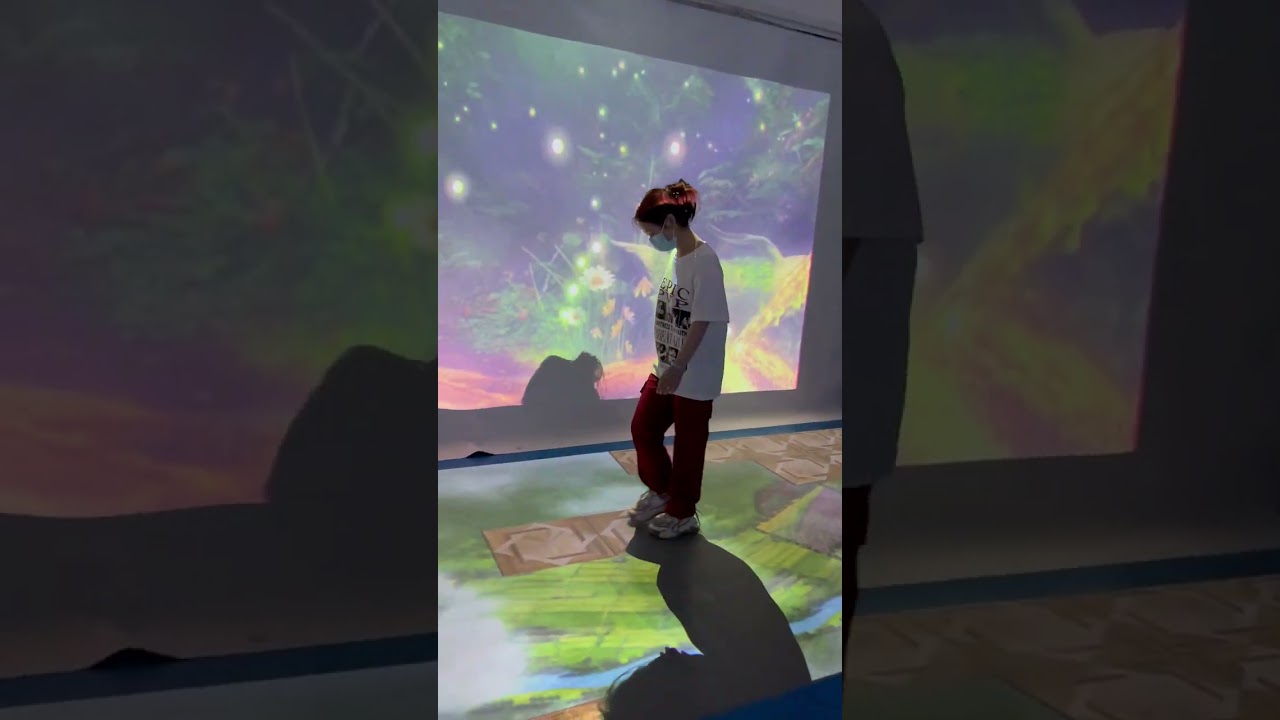 Interactive projection wall and floor game 
