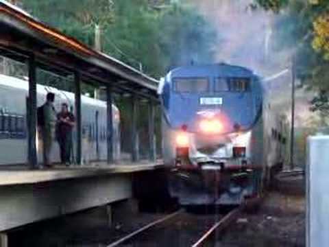 2 Metro North trains, both powered by Amtrak engines, meet at Wilton connecticut on the Danbury branch