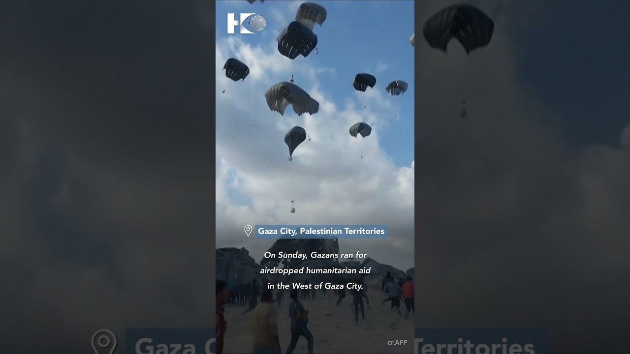 Gazans run for airdropped aid