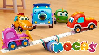 A catapult for Mocas! Toy cars cartoons for kids. Excavator, truck, bus, crane &amp; bulldozer.