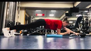 Plank with KB slide, alternating arms