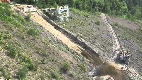 Geobrugg: Simulated landslide into flexible barrier