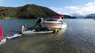 Leaky Boat with a broken down motor - All fixed up and back on the water...