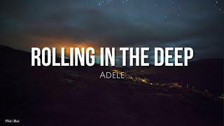 Video thumbnail of "Rolling in the deep (lyrics) - Adele [English - Spanish]"