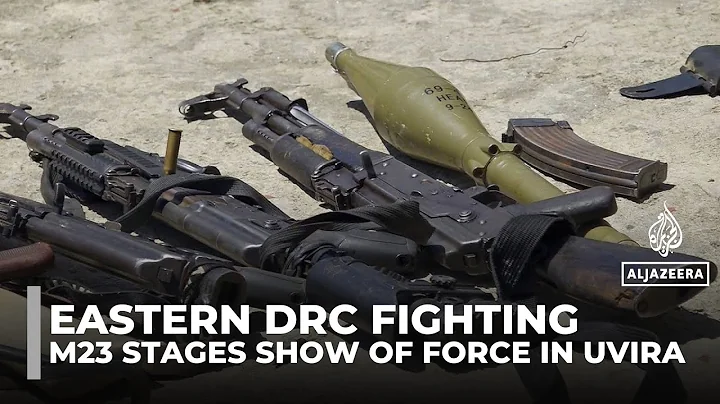 M23 rebels display seized arms in the captured DRC city of Uvira