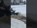 Grizzly 700 tearing through snow and water