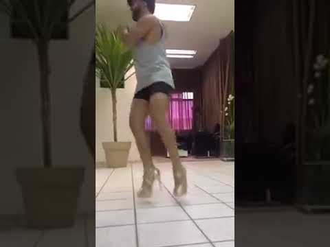 funny.-indian-guy-dances-to-music-with-bum-shorts-and-high-heels