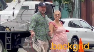 Liev Schreiber and his wife hold hands during their lovely stroll in New York City.