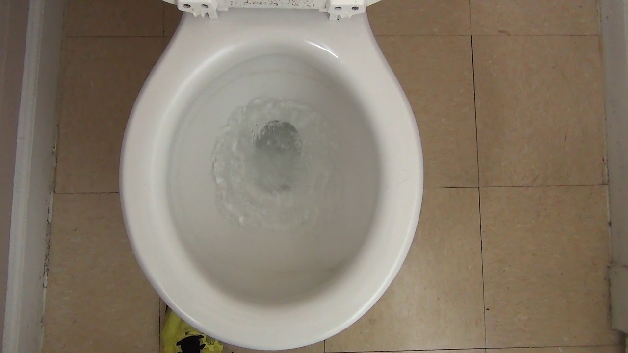 Bathroom tour: Standard and Gerber vintage toilets in an office building with elevator