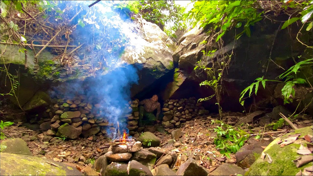 Build rock shelters and hunt fish in the forest to survive - YouTube