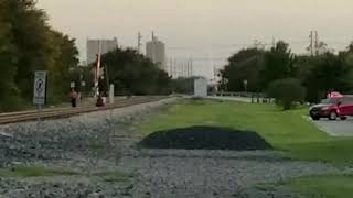 People with a death wish taking photos on the train tracks.