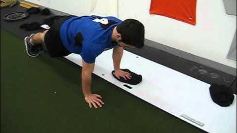 EricCressey.com: Slideboard Bodysaw Pushups