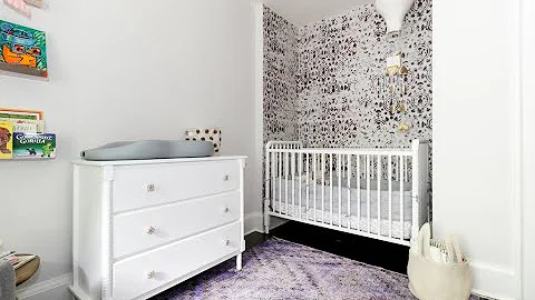 This punchy purple nursery has the best wallpaper
