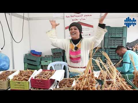 فلاحة تونسية جبت الدقلة و باش ندلل التوانسة عرجون من النخلة جديد مغلف مولاه لا يحتاج لا يتسلف