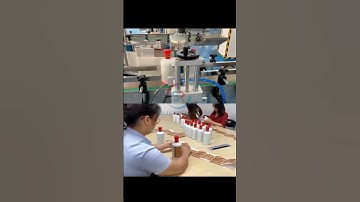 Stick label manually or use a labeling machine?