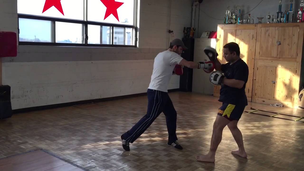 Hercules Kyvelos hitting boxing pads YouTube