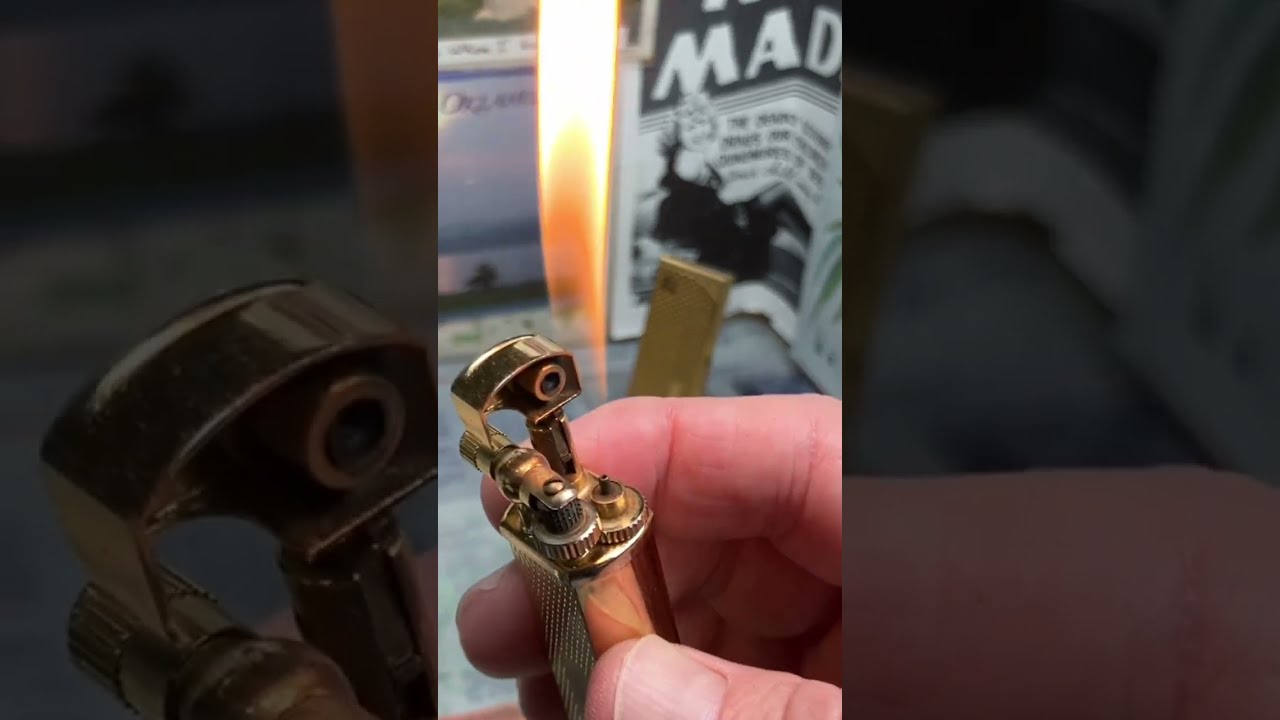 A Vintage BLITZ TOP JAPAN Butane Lighter With A Leaking