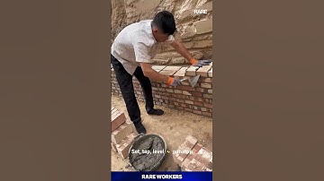 Watch this mason build a wall in seconds! 😱✨