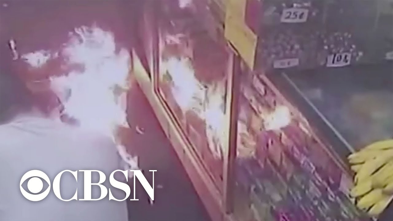 Man lights up fire in front of NYC deli YouTube