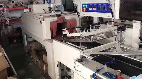 Mask carton box wrapping machine with electric shrinking tunnel machine export TO USA热收缩包装机