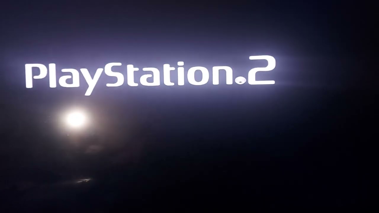 Silver Playstation 2 PS2 scph-90001 with memory card and fully working