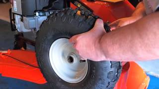Ariens snow blower  deluxe  taking off the  wheel an  keyway