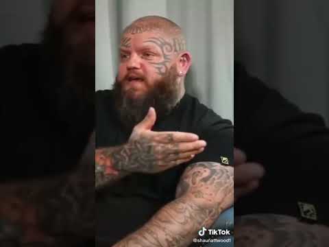Tattooed Man Grabs