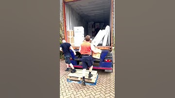 Speedy crew members loading a 20ft container