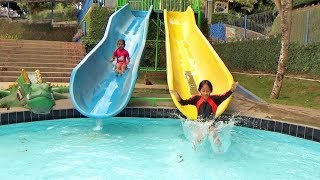 PLAY SLIDES AS YOU WISH Kids Playing Water & Slide in The Swimming Pool