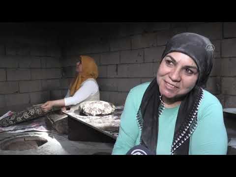 Karslı kadınlar ramazanda tandırları imece usulü yakıyor