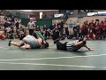 Wrestling officials spin and pin signal