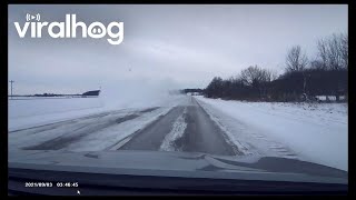 Dashcam Captures Car Fishtailing Into A Snowy Ditch || Viralhog