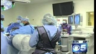 New robot makes back surgery safer, less painful