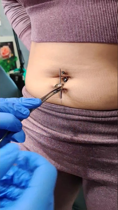 belly piercing by mayur sharma. angel's ink tattoos surat 9925794080 #piercing #youtube  #shorts