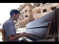 ISにピアノ燃やされ決意、欧州目指したシリア人音楽家