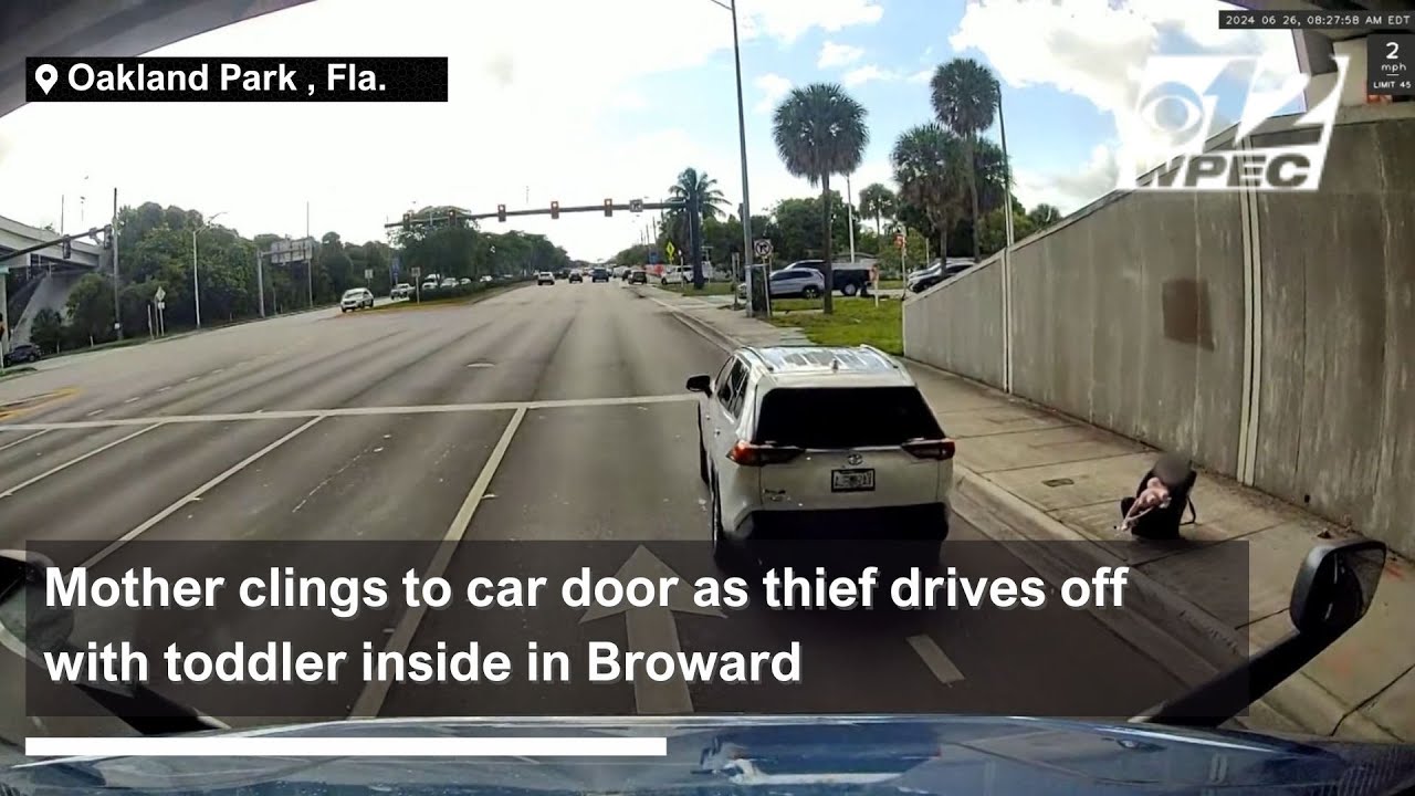 Mother clings to car door as thief drives off with toddler inside in ...