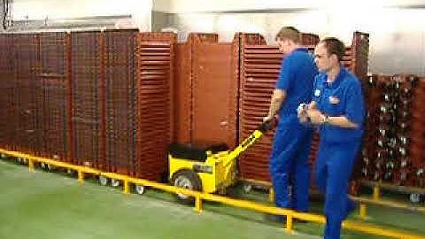 MasterMover electric tug pushes huge line of plastic crates