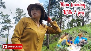 Mom and her 2 sons farming