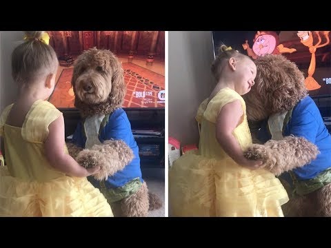 Toddler And Dog Dance As Beauty And Beast