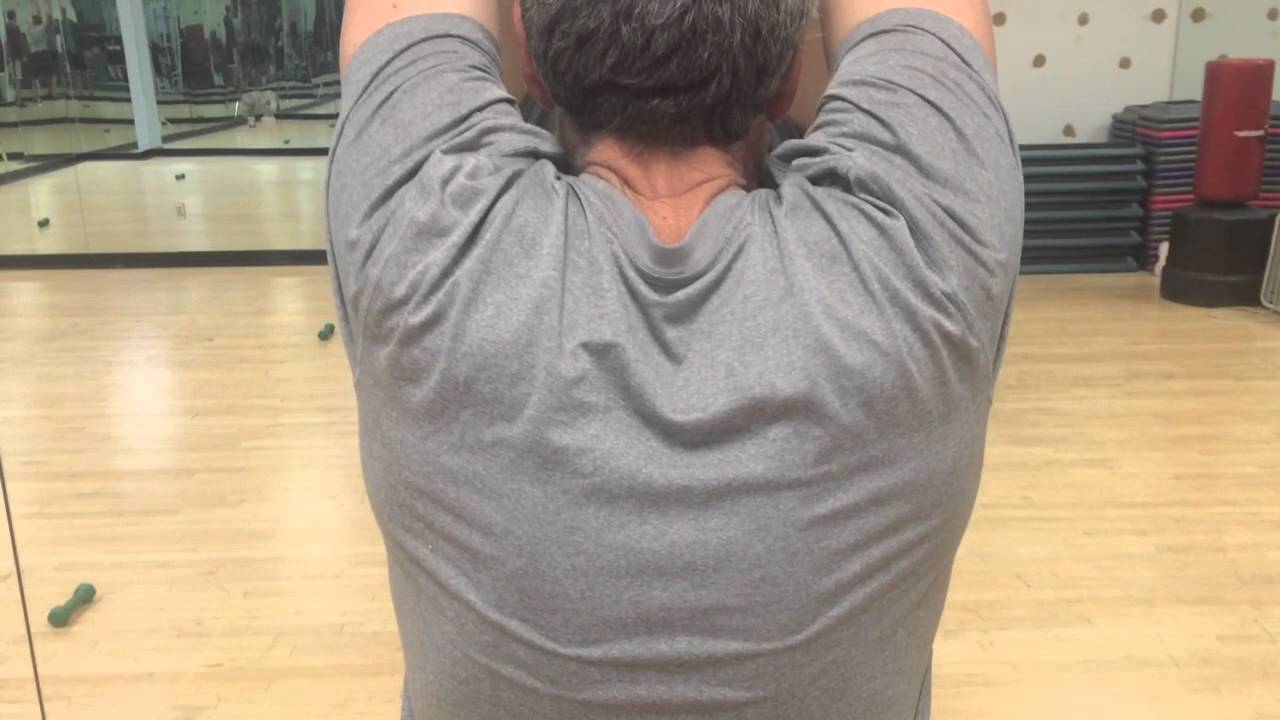 Trouble avoiding scapular retraction during overhead arm raise - YouTube