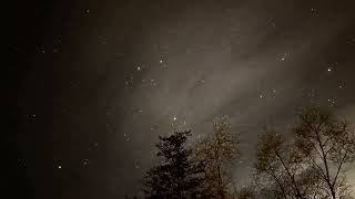Timelapse of moving stars and drifting clouds